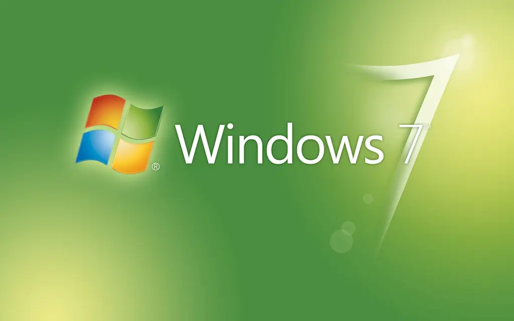 A green Windows 7 wallpaper with the four-paneled Windows logo on the left and a translucent “7” on the right.