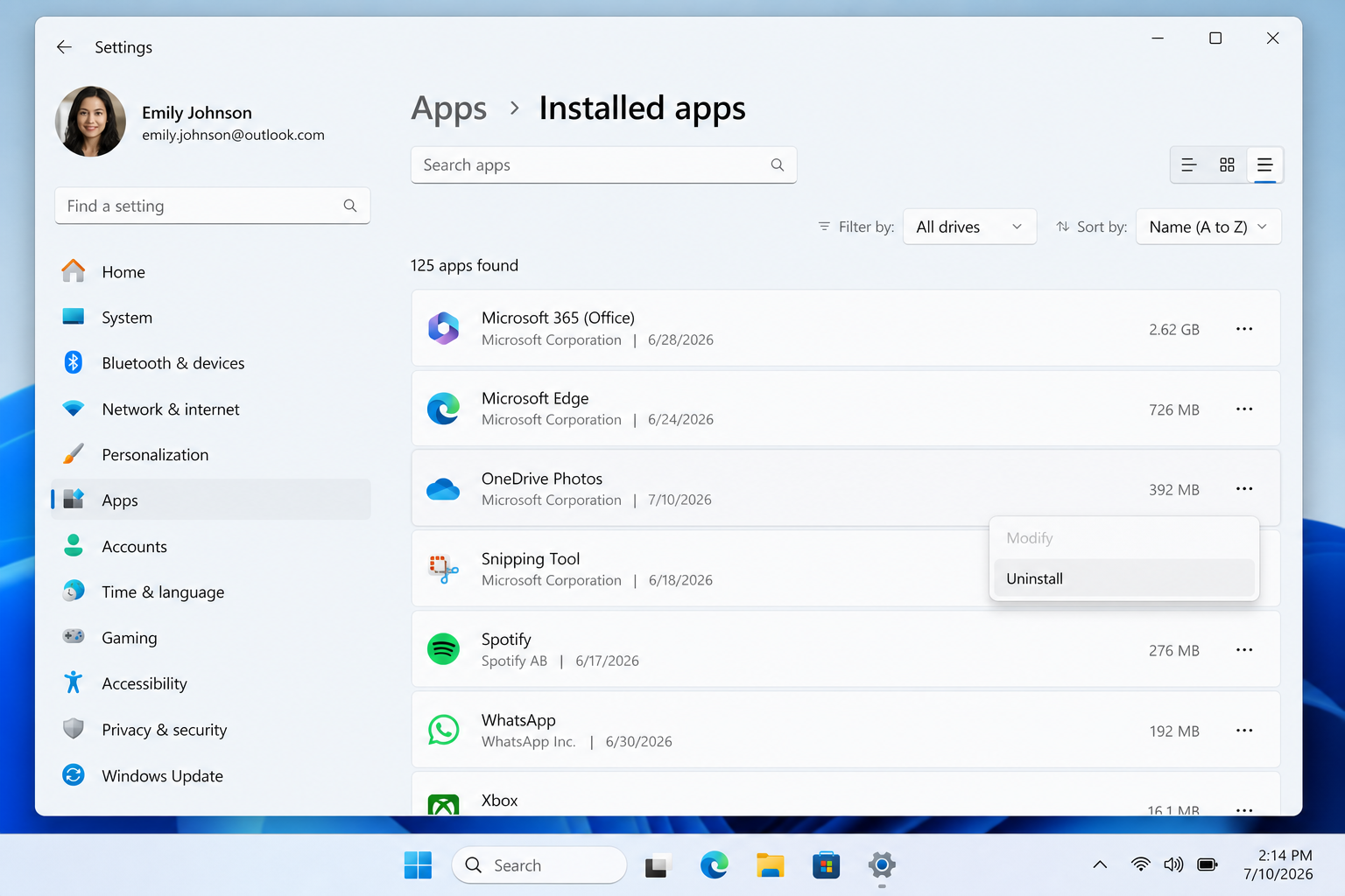 Windows 11 installed apps settings showing OneDrive Photos auto-install entry